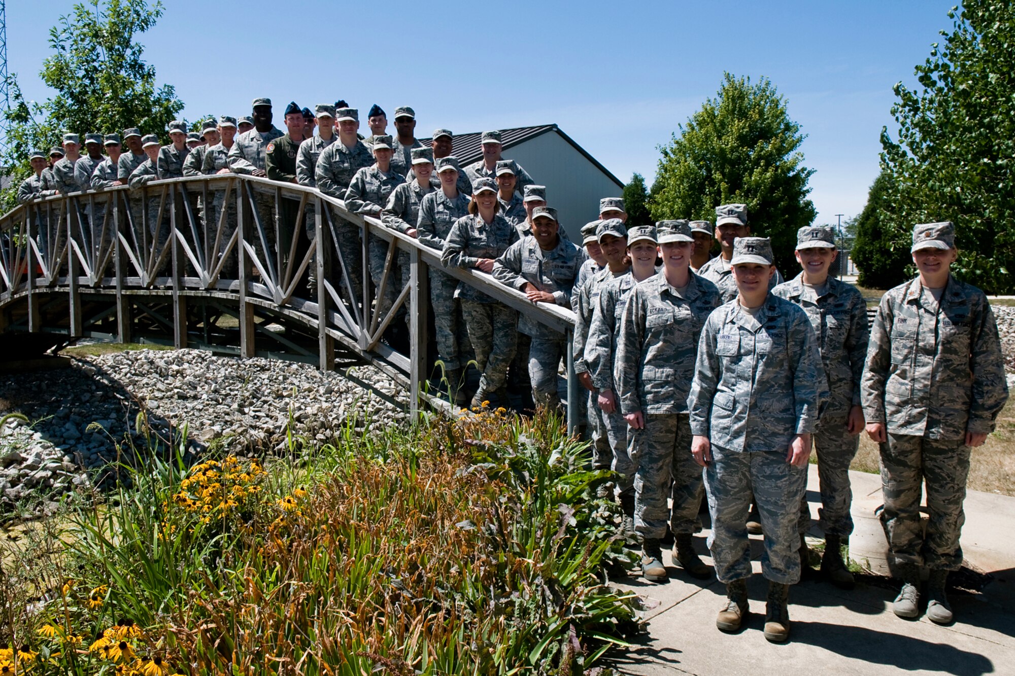 Air Force officers pose for a group photo during a Junior Officer Leadership Development Course at Grissom Air Reserve Base, Ind., Aug. 15, 2014. The course included classroom and field training portions to increase students' knowledge on leadership while also providing social interactions and networking opportunities. (U.S. Air Force photo/Tech. Sgt. Mark R. W. Orders-Woempner)  