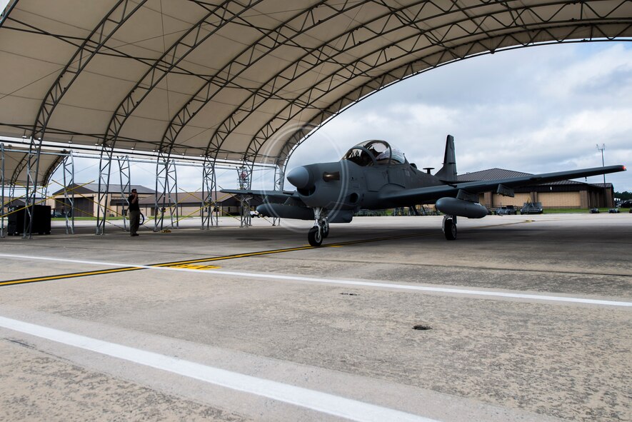 An A-29 Super Tucano taxis on the flightline Sept. 26, 2014, at Moody Air Force Base, Ga.  The Afghan A-29 Light Air Support training mission will begin at Moody in February 2015, and the A-29 will provide offensive and defensive aerial fires capability and reconnaissance and surveillance capability within Afghanistan. (U.S. Air Force photo by Airman 1st Class Dillian Bamman/Released)