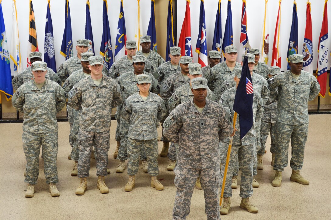 U.S. Army Soldiers assigned to the 510th Human Resource Company, 53rd Transportation Battalion (Movement Control), 7th Transportation Brigade (Expeditionary), stand in formation during a deployment ceremony at Fort Eustis, Va., Sept. 20, 2014. The team will be responsible for postal operations across four countries in the Middle East in support of Operation Enduring Freedom. (U.S. Army photo by Spc. Marian Alleva/Released)