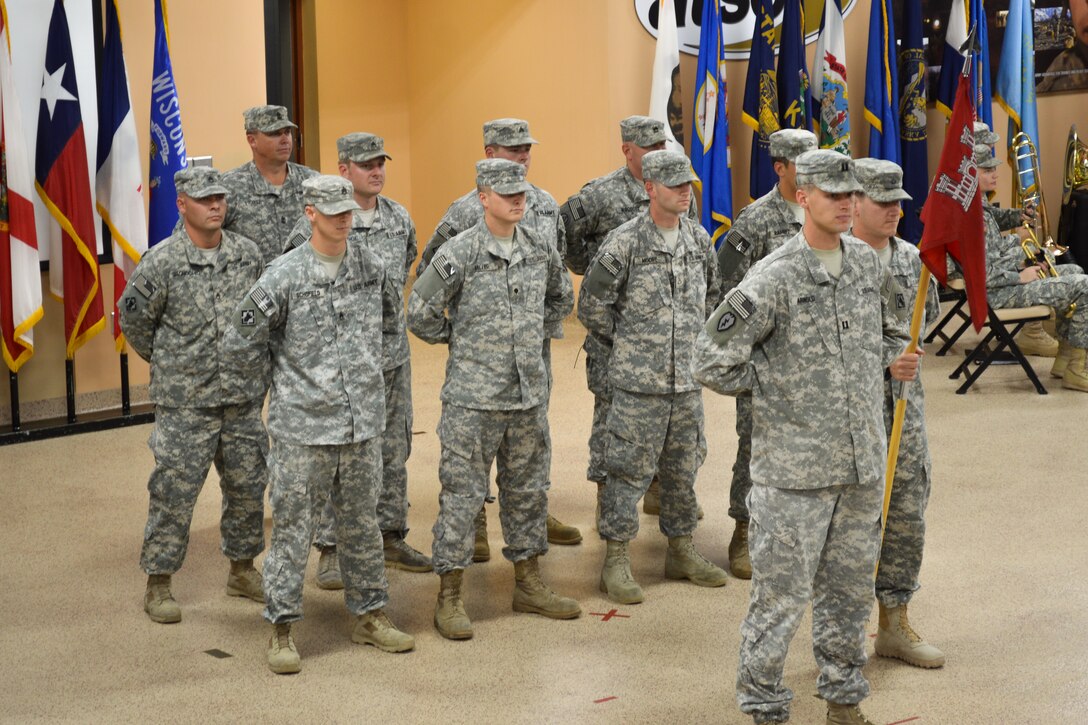 U.S. Army Soldiers assigned to the 569th Engineer Detachment, 30th Engineer Battalion, 7th Transportation Brigade (Expeditionary), stand in formation during a deployment ceremony at Fort Eustis, Va., Sept. 20, 2014. The team will provide engineer support to theater commanders in the areas of ports, harbors, inland waterways and littoral zones in support of Operation Enduring Freedom. (U.S. Army photo by Spc. Marian Alleva/Released)