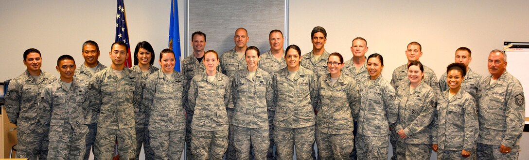 TRAVIS AIR FORCE BASE, Calif. -- Members of the 349th Air Mobility Wing graduate from the HQ Air Force Reserve Command NCO Leadership Developement Course, Sept. 19, 2014 (U. S. Air Force photos/2Lt Stephen Collier)