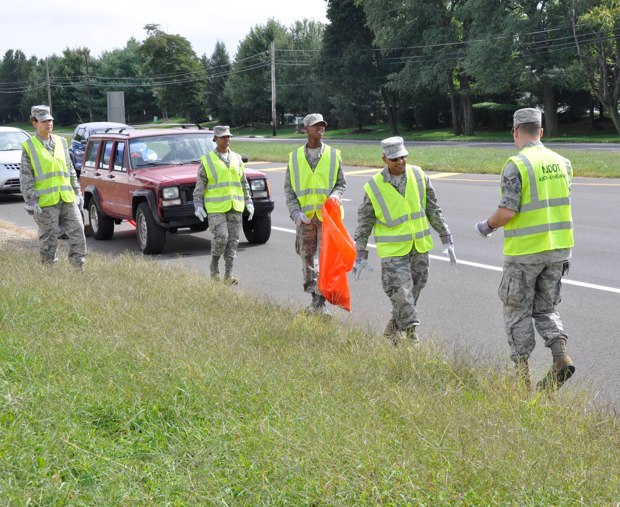 Members from the 514th Airman’s Council collect trash and debris along New Jersey Route 68  in Columbus, N.J Sept. 21 as part of the New Jersey Department of Transportation and Clean Communities Council’s Adopt-A-Highway program. The Adopt-A-Highway program is a comprehensive, statewide, volunteer program created by the New Jersey Department of Transportation and the New Jersey Clean Communities Council to encourage volunteers to clean and maintain state highways (U.S. Air Force photo/ Tech. Sgt. Jonathan E. White). 