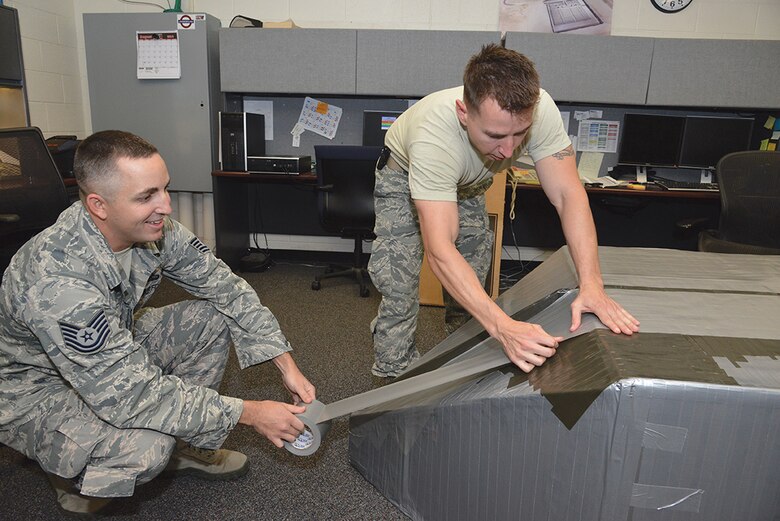 Airmen sink spare time in duct tape boat > Kirtland Air ...