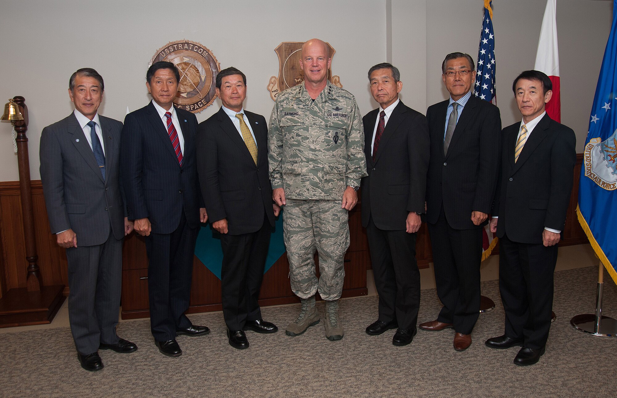 U.S. Air Force Lt. Gen. John W. Raymond, commander, 14th Air Force and Joint Functional Component Command (JFCC) for Space, stands with retired Japan Self-Defense Force (JSDF) generals during a Japan America Air Force Goodwill Association (JAAGA) visit, Sep. 12, 2014, at Vandenberg Air Force Base, Calif. The JAAGA delegation, which advises current U.S. and Japanese military leadership, spent time visiting with 14th Air Force and JFCC Space leadership and touring the Joint Space Operations Center (JSpOC) in an effort to bolster existing partnerships in Space Situational Awareness (SSA). (U.S. Air Force Photo by Michael Peterson/Released)