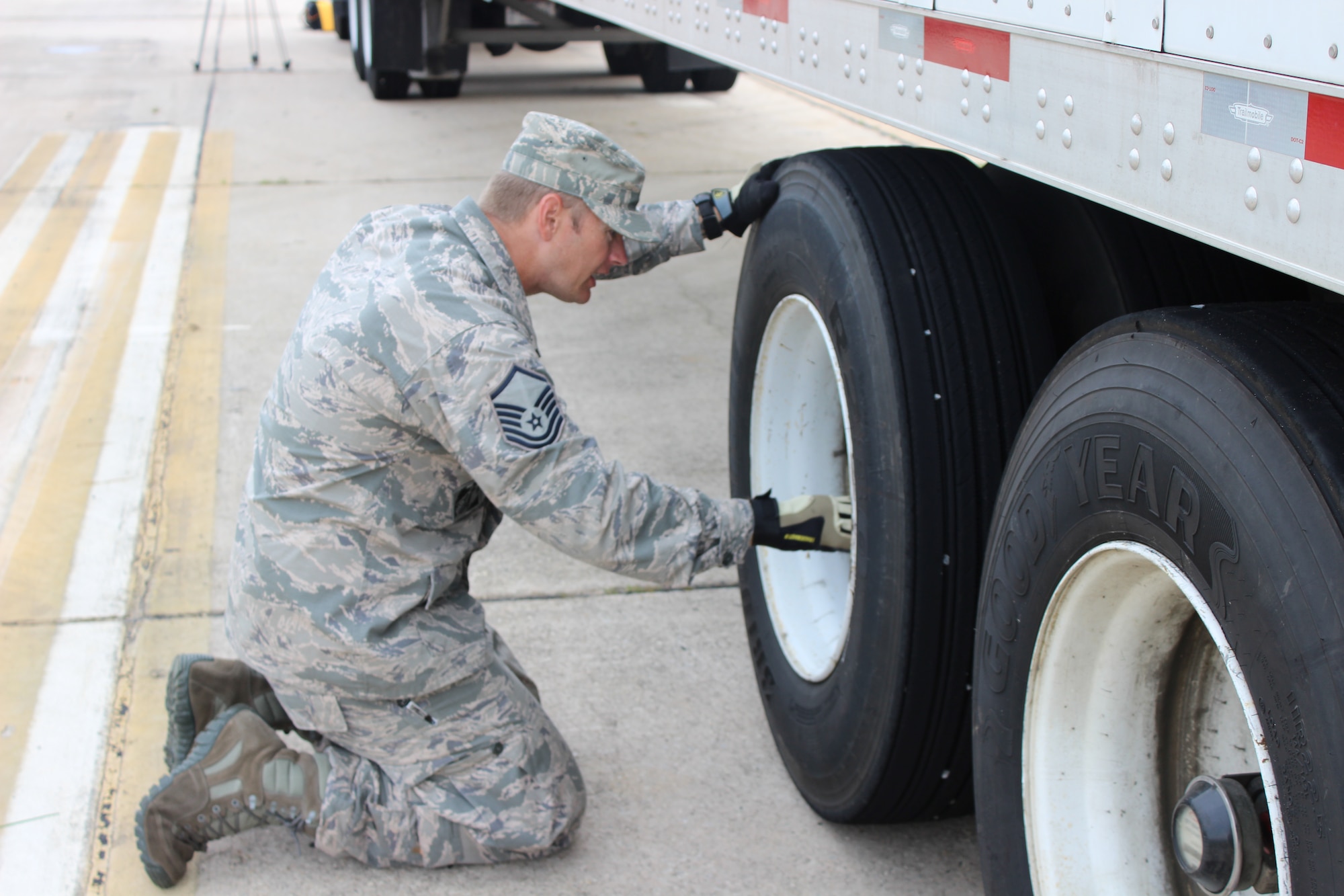 Master Sgt. Michael Mabe goes through a pre-trip inspection on his tractor trailer at Dobbins Air Reserve Base, Ga. Mabe recently completed tractor trailer training, or 3T, class at the Expeditionary Combat Support-Training Certification Center at Dobbins. After the course, he submitted the required documentation and passed a written state-required test to get his Florida commercial driver’s license. (U.S. Air Force Photo/Amy Ausley/Released)