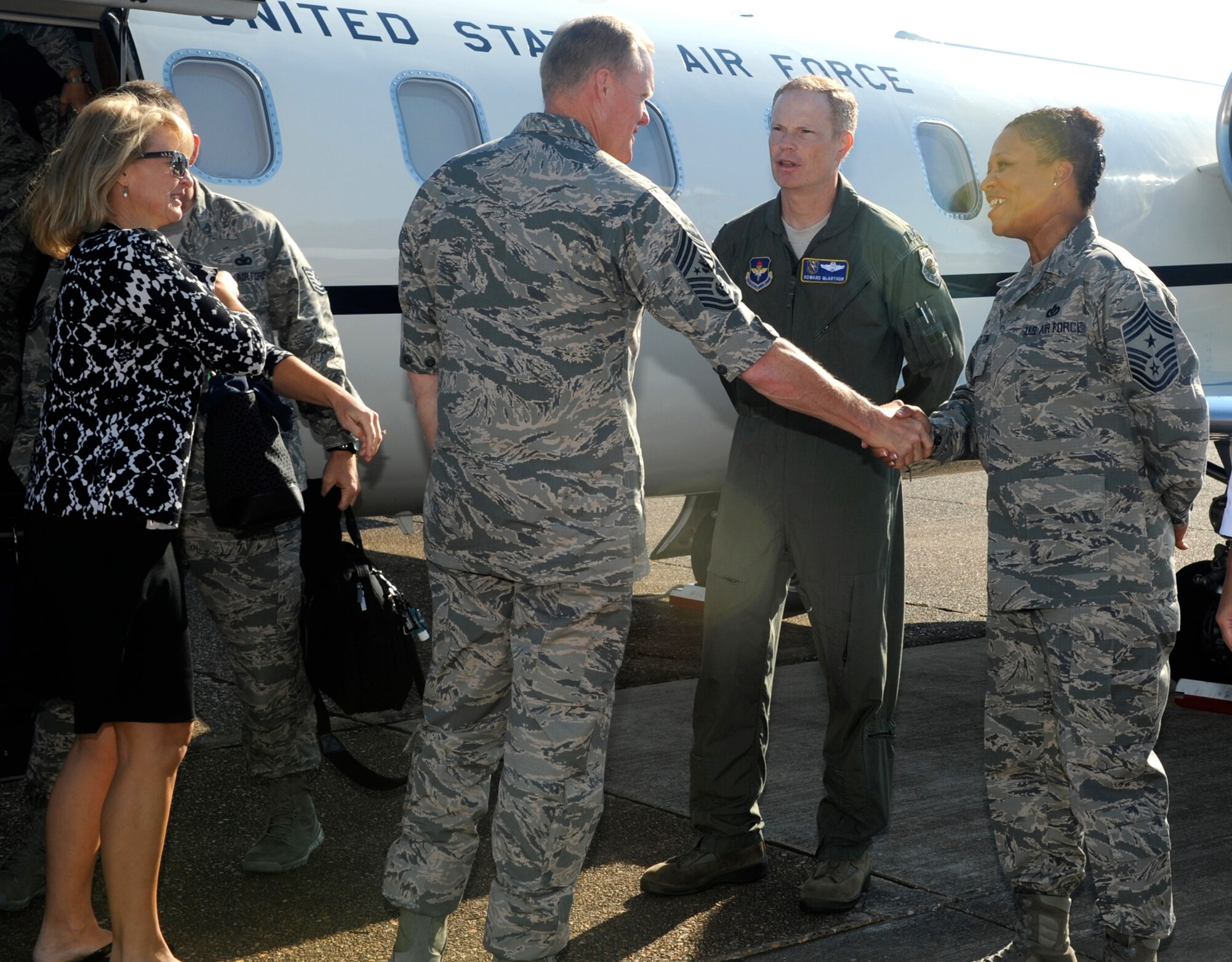 Chief Master Sgt. of the Air Force James Cody and his wife, retired Chief Master Sgt. Athena Cody, meet with Col. Howard McArthur, 14th Flying Training Wing Vice Commander, and Chief Master Sgt. Rita Felton, 14th FTW Command Chief, upon their arrival to Columbus Air Force Base, Mississippi, Sept. 24. During their visit, the Codys met with Airmen, civilians and spouses across the 14th Flying Training Wing to discuss Air Force key issues, Team BLAZE issues, local success stories and more. (U.S. Air Force photo/Elizabeth Owens)
