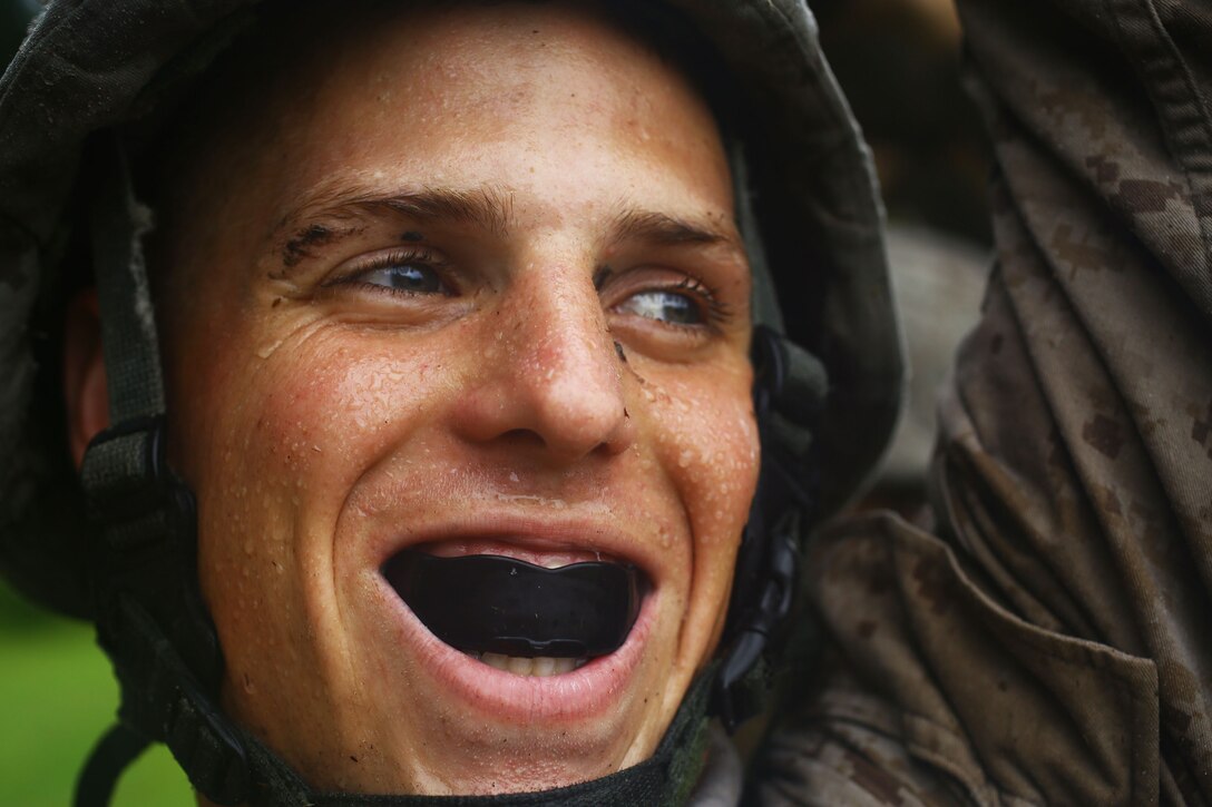 Marine Corps Cpl. Patrick D. Whitney participates in log drills during a martial arts instructor course on Marine Corps Air Station Cherry Point, N.C., Sept. 24, 2014. 