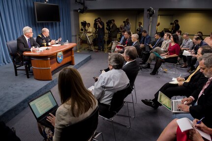 18th Chairman of the Joint Chiefs of Staff Gen. Martin E. Dempsey joined Secretary of Defense Hon. Chuck Hagel at to address the media in the Pentagon Briefing Room, Sept. 26, 2014.