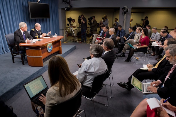 18th Chairman of the Joint Chiefs of Staff Gen. Martin E. Dempsey joined Secretary of Defense Hon. Chuck Hagel at to address the media in the Pentagon Briefing Room, Sept. 26, 2014.