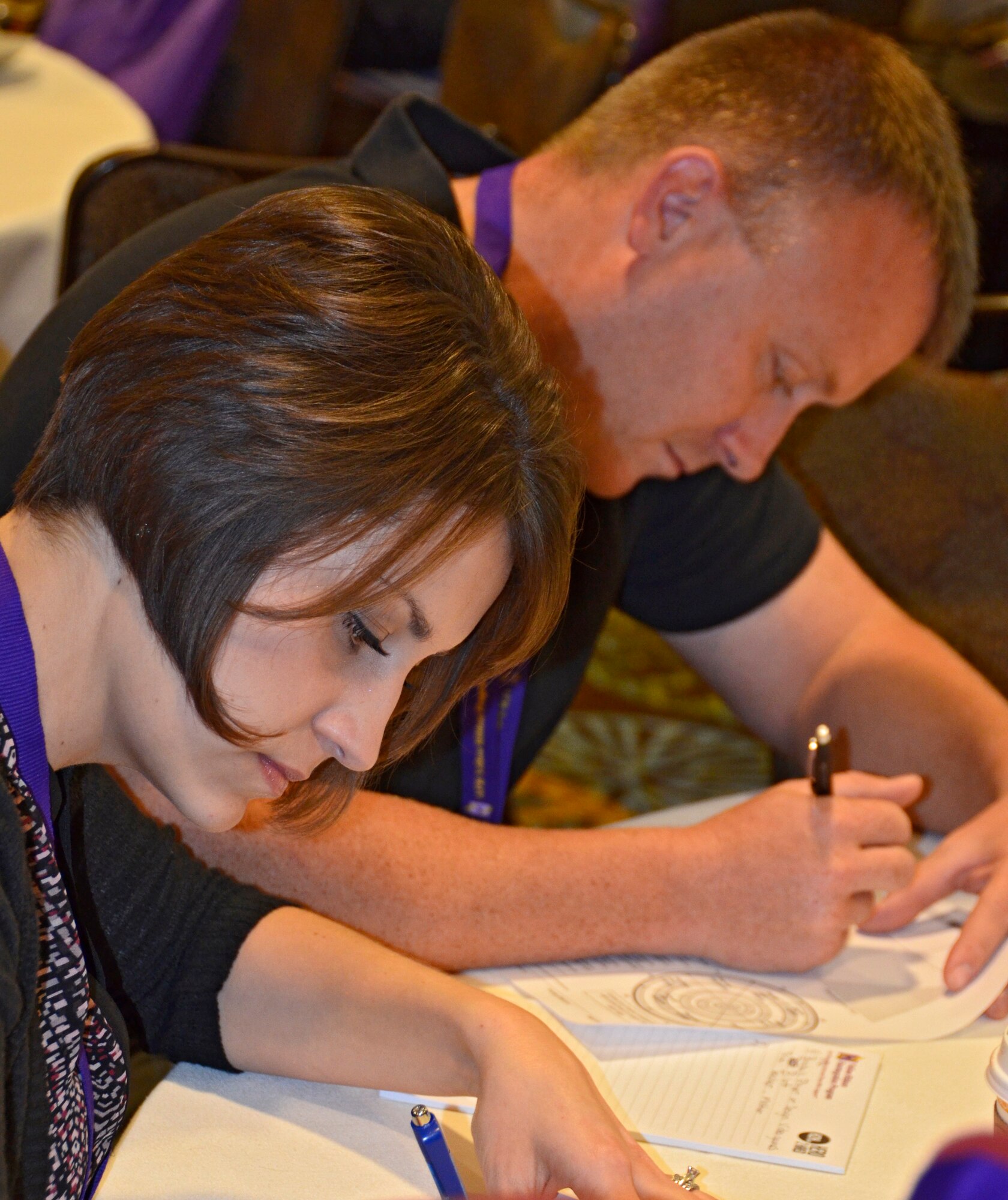 SrA. Christopher Peterson and his wife, Trista, fill out worksheets while evaluating their priorities and other challenges in their lives during the Yellow Ribbon Program's "Finding the Balance" breakout session Sept. 27 in Orlando, Fla. Peterson is an air transportation specialist with the 87th Aerial Port Squadron with the Air Force Reserve's 445th Airlift Wing, Wright-Patterson Air Force Base, Ohio. (U.S. Air Force photo by MSgt. Andrew Biscoe)