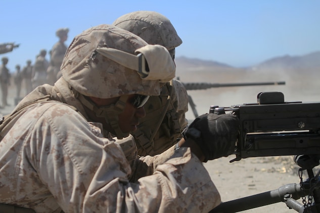 Lance Corporal Dashaun Dancy, an ammo technician with Ammo Company, 1st Supply Battalion fires an M2 .50-caliber machine gun aboard Marine Corps Base Camp Pendleton, Calif., Sept. 17, 2014. The Marines were required to engage simulated targets with weapons ranging from M1014 shotguns to AT-4 rocket launchers. The live-fire ranges were part of an annual training package to keep the Marines confident and proficient with each weapon system.