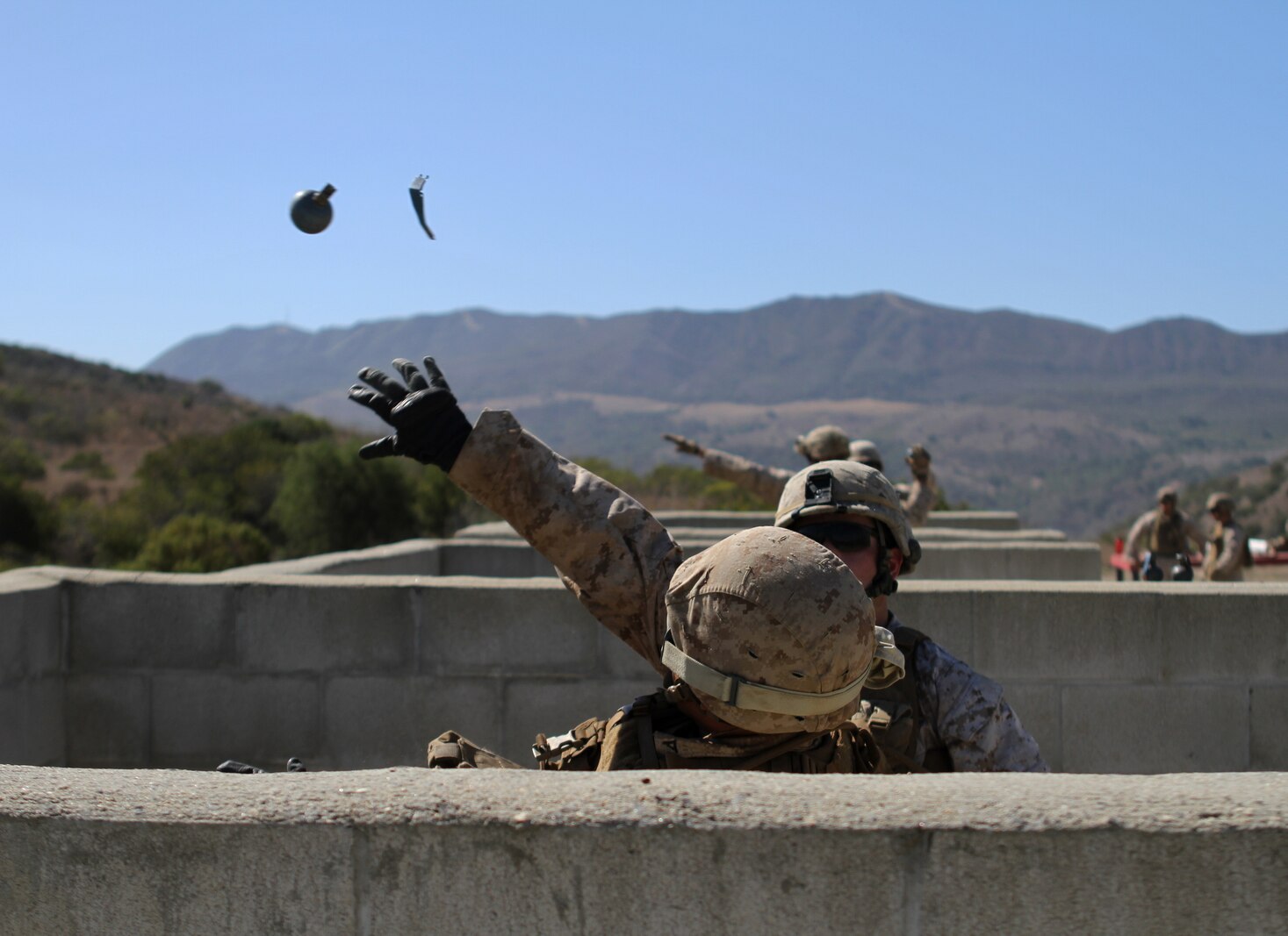 Ammo technicians with Ammo Company, 1st Supply Battalion, conduct practical application procedures before moving on to the live grenade range aboard Marine Corps Base Camp Pendleton, Sept. 16, 2014. It was part of the annual training to refresh the Marine’s ability to function with a live grenade. The live-fire ranges were part of an annual training package to keep the Marines confident and proficient with each weapon system.