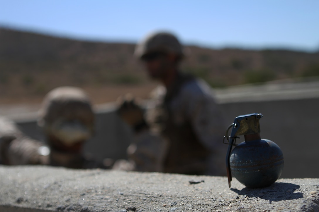 Ammo technicians with Ammo Company, 1st Supply Battalion, conduct practical application procedures before moving on to the live grenade range aboard Marine Corps Base Camp Pendleton, Sept. 16, 2014. It was part of the annual training to refresh the Marine’s ability to function with a live grenade. The live-fire ranges were part of an annual training package to keep the Marines confident and proficient with each weapon system.