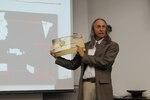 Dr. Craig Howe, founder and director of the Center for American Indian Research and Native Studies, talks about the nine reservations located in South Dakota during a Native American cultural awareness workshop at Camp Rapid, Rapid City, S.D., Sept. 25, 2014. The intent of the workshop was to gain a better understanding of Native American tribes, culture and communities.