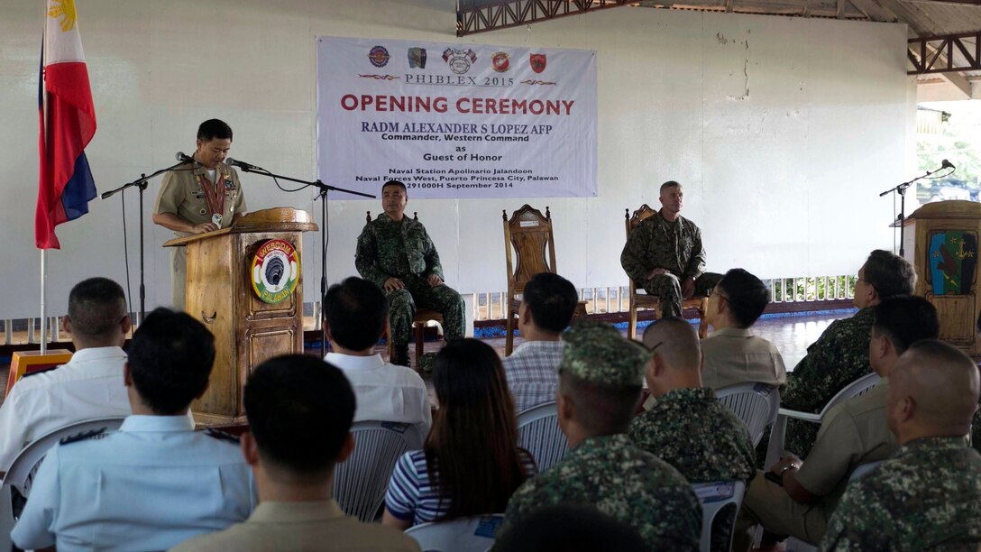 Philippine Navy Rear Adm. Alexander Lopez speaks to members of the Armed Forces of the Philippines and U.S. Marines and Navy at the opening ceremony for Amphibious Landing Exercise 2015 Sept. 29 in Puerto Princesa, Palawan, Philippines. PHIBLEX is an annual, bilateral training exercise conducted by the Armed Forces of the Philippines, U.S. Marines and Navy to strengthen interoperability across a range of capabilities, including disaster relief and contingency operations. Lopez is the Western Command Commander, AFP.