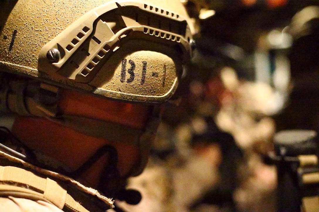 Staff Sgt. Joshua Gehret, a reconnaissance man with the reconnaissance detachment, 11th Marine Expeditionary Unit (MEU), loads into an MV-22B Osprey from Marine Medium Tiltrotor Squadron 163 (Reinforced), 11th MEU, for a rehearsal of a tactical recovery of aircraft and personnel mission, Sept. 24. Marines from the 11th MEU are deployed with the Makin Island Amphibious Ready Group as a flexible, adaptable and persistent force in the U.S. 5th Fleet area of responsibility. (U.S. Marine Corps photo by Lance Cpl. Evan R. White/ Released)