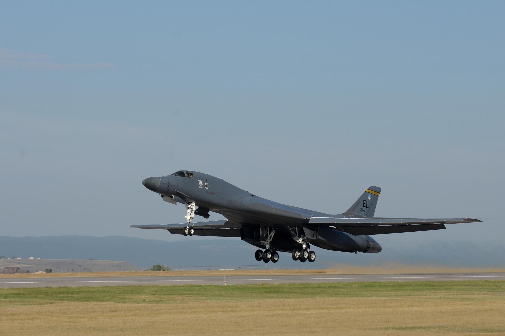 A B-1 bomber takes off for the Global Strike Challenge at Ellsworth Air Force Base, S.D., Sept. 18, 2014. Twelve bases are participating in the competition, with more than 400 airmen competing to earn their base trophies that will be awarded in early Nov. during a symposium at Barksdale Air Force Base, La. (U.S. Air Force photo by Airman 1st Class Rebecca Imwalle/Released) 