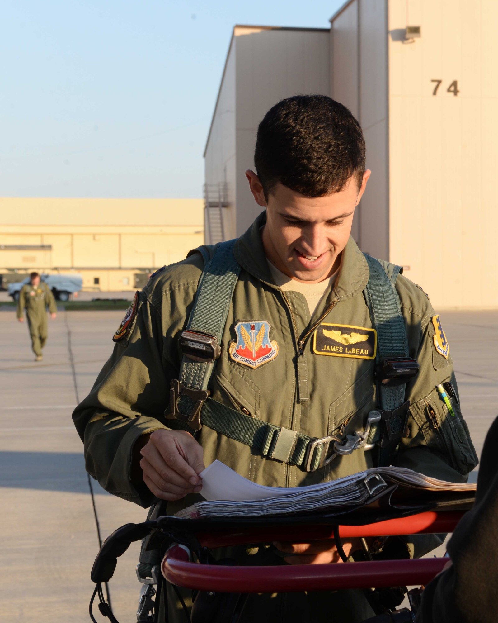Capt. James LeBeau, 37th Bomb Squadron co-pilot, reviews aircraft forms prior to take off for the Global Strike Challenge at Ellsworth Air Force Base, S.D., Sept. 18, 2014. The Global Strike Challenge is the world’s premier bomber, Intercontinental Ballistic Missile, helicopter operations and security forces competition, which incorporates twelve bases and is used to foster esprit de corps and improve combat capabilities through competition and team work. (U.S. Air Force photo by Airman 1st Class Rebecca Imwalle/Released)