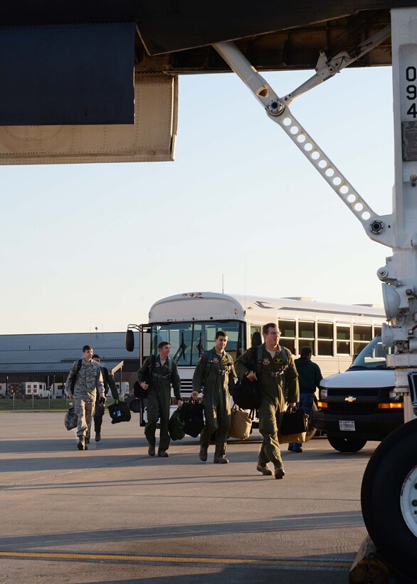 Aircrews from the 37th Bomb Squadron arrive on the flightline for the Global Strike Challenge at Ellsworth Air Force Base, S.D., Sept. 18, 2014. Throughout the competition sorties, aircrew members are evaluated on multiple segments, earning points to compete for the Fairchild Trophy and the LeMay Trophy. (U.S. Air Force photo by Airman 1st Class Rebecca Imwalle/Released)