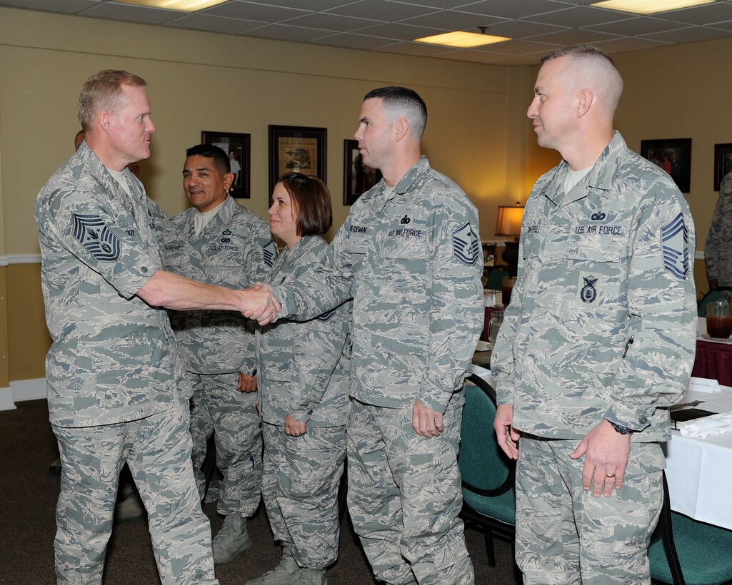 Chief Master Sgt. of the Air Force James Cody greets members of the Team BLAZE Focus Group Sept. 24 during his visit to Columbus Air Force Base, Mississippi, Sept. 24-25. The focus group was recently assembled to discuss improving the quality of life for Columbus AFB Airmen, retirees, spouses, family members and civilian employees. (U.S. Air Force photo/Elizabeth Owens)