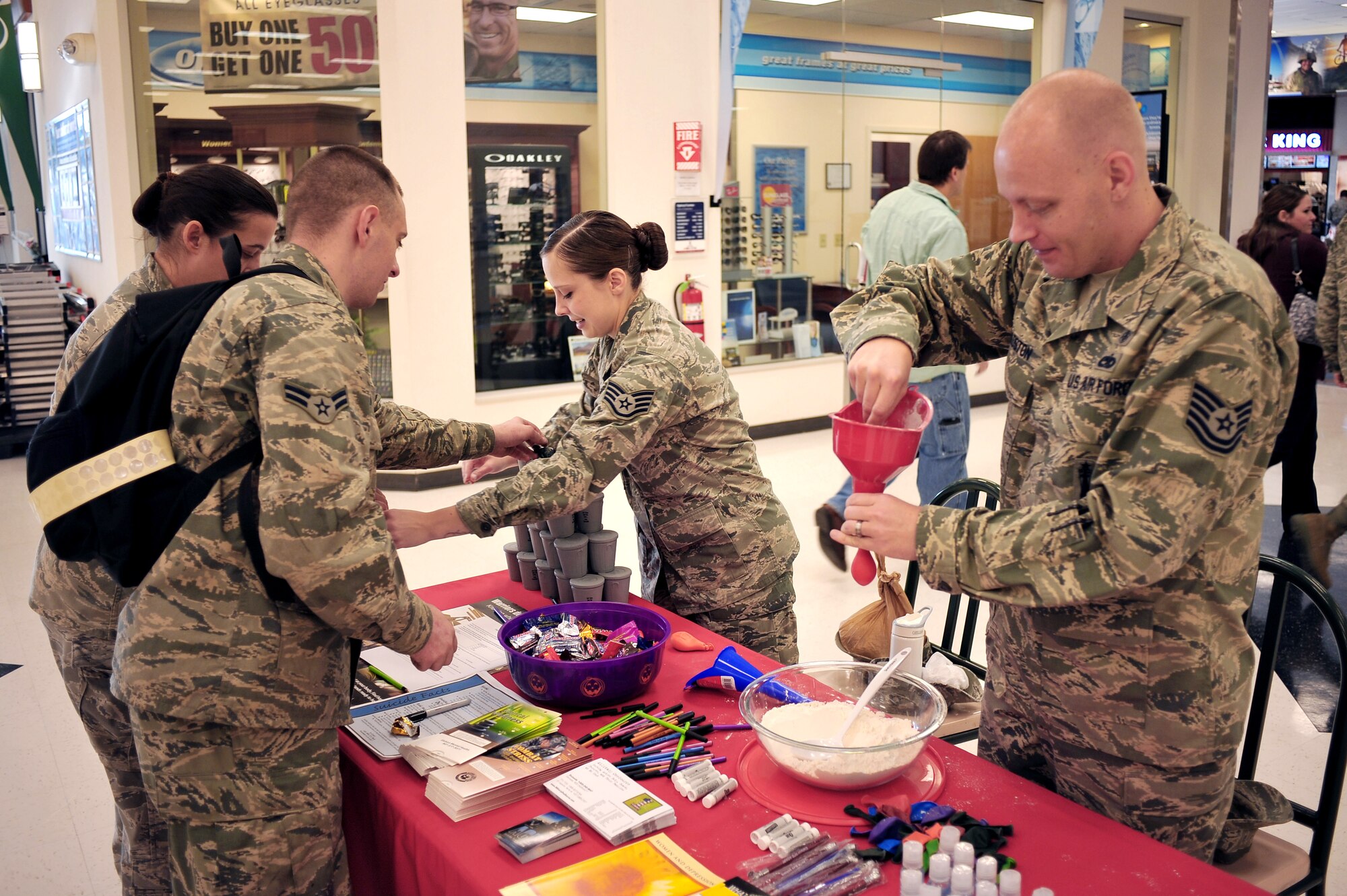 Icemen assigned to the 354th Medical Operations Squadron mental health flight spreads word about the Early Mental Health Help-Seeking Campaign at Eielson Air Force Base, Alaska, Sept. 23, 2014. The goal is to encourage Airmen struggling with mental health issues to visit the mental health clinic, primary care provider or other mental health professional. (U.S. Air Force photo by Staff Sgt. Jim Araos/Released)