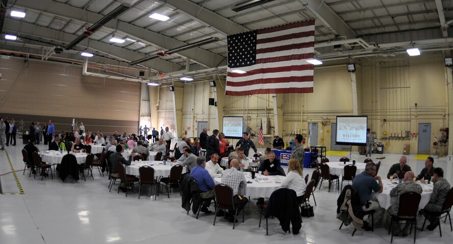 Civilian employers eat breakfast during the Employer Support of the Guard and Reserve “Breakfast with the Boss” at the 182nd Airlift Wing in Peoria, Ill., Sept. 17, 2014. The attendees visited the base to see firsthand how their employees serve the Illinois’ reserve military and how employers play an important role in the defense of the nation. The Department of Defense established ESGR in 1972 to promote the relationship between service members and their civilian employers. (U.S. Air National Guard photo by Staff Sgt. Lealan Buehrer/Released)