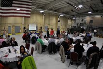 Civilian employers eat breakfast during the Employer Support of the Guard and Reserve “Breakfast with the Boss” at the 182nd Airlift Wing in Peoria, Ill., Sept. 17, 2014. The attendees visited the base to see firsthand how their employees serve the Illinois’ reserve military and how employers play an important role in the defense of the nation. The Department of Defense established ESGR in 1972 to promote the relationship between service members and their civilian employers. (U.S. Air National Guard photo by Staff Sgt. Lealan Buehrer/Released)