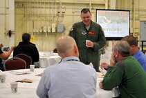 U.S. Air Force Col. William P. Robertson, commander of the 182nd Airlift Wing, visits with civilian employers during the Employer Support of the Guard and Reserve “Breakfast with the Boss” at the 182nd Airlift Wing in Peoria, Ill., Sept. 17, 2014. The attendees visited the base to see firsthand how their employees serve the Illinois’ reserve military and how employers play an important role in the defense of the nation. The Department of Defense established ESGR in 1972 to promote the relationship between service members and their civilian employers. (U.S. Air National Guard photo by Staff Sgt. Lealan Buehrer/Released)