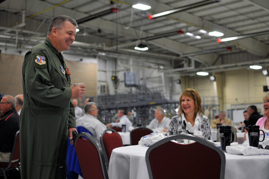 U.S. Air Force Col. William P. Robertson, commander of the 182nd Airlift Wing, visits with civilian employers during the Employer Support of the Guard and Reserve “Breakfast with the Boss” at the 182nd Airlift Wing in Peoria, Ill., Sept. 17, 2014. The attendees visited the base to see firsthand how their employees serve the Illinois’ reserve military and how employers play an important role in the defense of the nation. The Department of Defense established ESGR in 1972 to promote the relationship between service members and their civilian employers. (U.S. Air National Guard photo by Staff Sgt. Lealan Buehrer/Released)