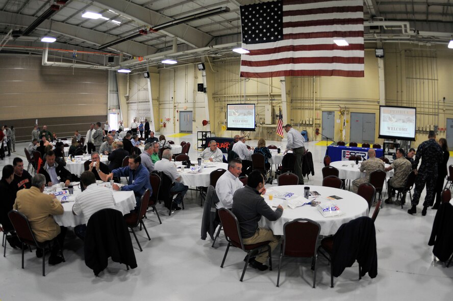 Civilian employers eat breakfast during the Employer Support of the Guard and Reserve “Breakfast with the Boss” at the 182nd Airlift Wing in Peoria, Ill., Sept. 17, 2014. The attendees visited the base to see firsthand how their employees serve the Illinois’ reserve military and how employers play an important role in the defense of the nation. The Department of Defense established ESGR in 1972 to promote the relationship between service members and their civilian employers. (U.S. Air National Guard photo by Staff Sgt. Lealan Buehrer/Released)