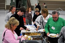 Civilian employers get breakfast during the Employer Support of the Guard and Reserve “Breakfast with the Boss” at the 182nd Airlift Wing in Peoria, Ill., Sept. 17, 2014. The attendees visited the base to see firsthand how their employees serve the Illinois’ reserve military and how employers play an important role in the defense of the nation. The Department of Defense established ESGR in 1972 to promote the relationship between service members and their civilian employers. (U.S. Air National Guard photo by Staff Sgt. Lealan Buehrer/Released)