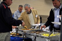 Civilian employers get breakfast during the Employer Support of the Guard and Reserve “Breakfast with the Boss” at the 182nd Airlift Wing in Peoria, Ill., Sept. 17, 2014. The attendees visited the base to see firsthand how their employees serve the Illinois’ reserve military and how employers play an important role in the defense of the nation. The Department of Defense established ESGR in 1972 to promote the relationship between service members and their civilian employers. (U.S. Air National Guard photo by Staff Sgt. Lealan Buehrer/Released)
