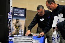 Ron Bacci, Illinois state chair of the Employer Support of the Guard and Reserve, speaks with civilian employers during the ESGR “Breakfast with the Boss” at the 182nd Airlift Wing in Peoria, Ill., Sept. 17, 2014. The attendees visited the base to see firsthand how their employees serve the Illinois’ reserve military and how employers play an important role in the defense of the nation. The Department of Defense established ESGR in 1972 to promote the relationship between service members and their civilian employers. (U.S. Air National Guard photo by Staff Sgt. Lealan Buehrer/Released)