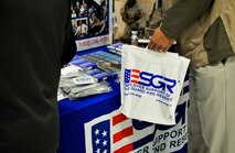Civilian employers read literature during the Employer Support of the Guard and Reserve “Breakfast with the Boss” at the 182nd Airlift Wing in Peoria, Ill., Sept. 17, 2014. The attendees visited the base to see firsthand how their employees serve the Illinois’ reserve military and how employers play an important role in the defense of the nation. The Department of Defense established ESGR in 1972 to promote the relationship between service members and their civilian employers. (U.S. Air National Guard photo by Staff Sgt. Lealan Buehrer/Released)