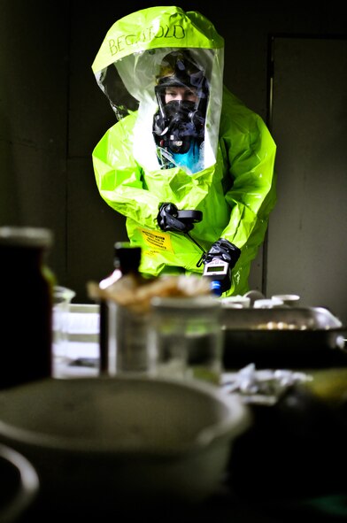 U.S. Air Force Tech. Sgt. Eve L. Wasche, an emergency management specialists with the 182nd Civil Engineer Squadron, during a weapon of mass destruction exercise at the 182nd Airlift Wing in Peoria, Ill., June 8, 2014. Soldiers and Airmen with the Illinois National Guard practiced entry, identification and decontamination training in conjunction with the Illinois Army National Guard’s 5th Civil Support Team. (U.S. Air National Guard photo by Staff Sgt. Lealan Buehrer/Released)