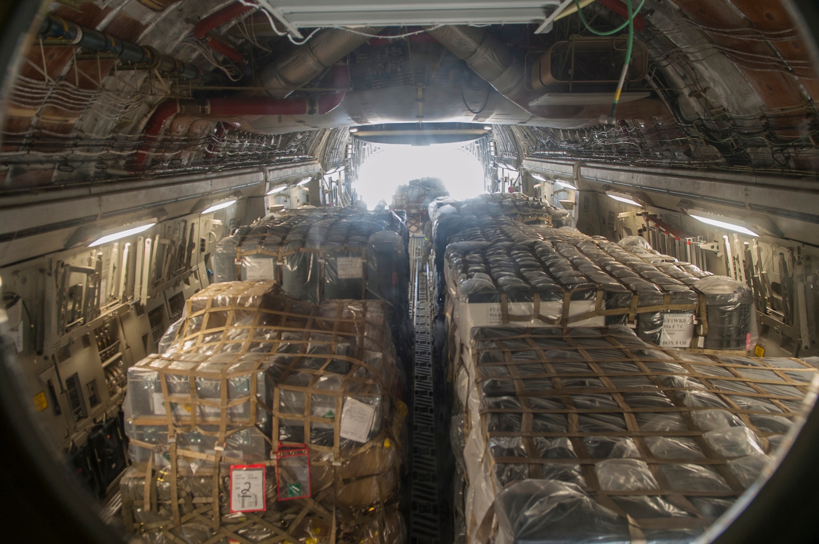 Airmen from the 502nd Logistics Readiness Squadron, Lackland JBSA, load medical supplies from the Air Force Medical Operations Agency onto a C-17 Globemaster III at Kelly Field Annex, Sept. 25, 2014. The C-17 was deployed from Altus AFB -- 97 Air Mobility Wing to support United States Africa Command and United Nations operations and efforts to fortify global health security infrastructure in the region and beyond. (U.S. Air Force photo by Airman Justine K. Rho)