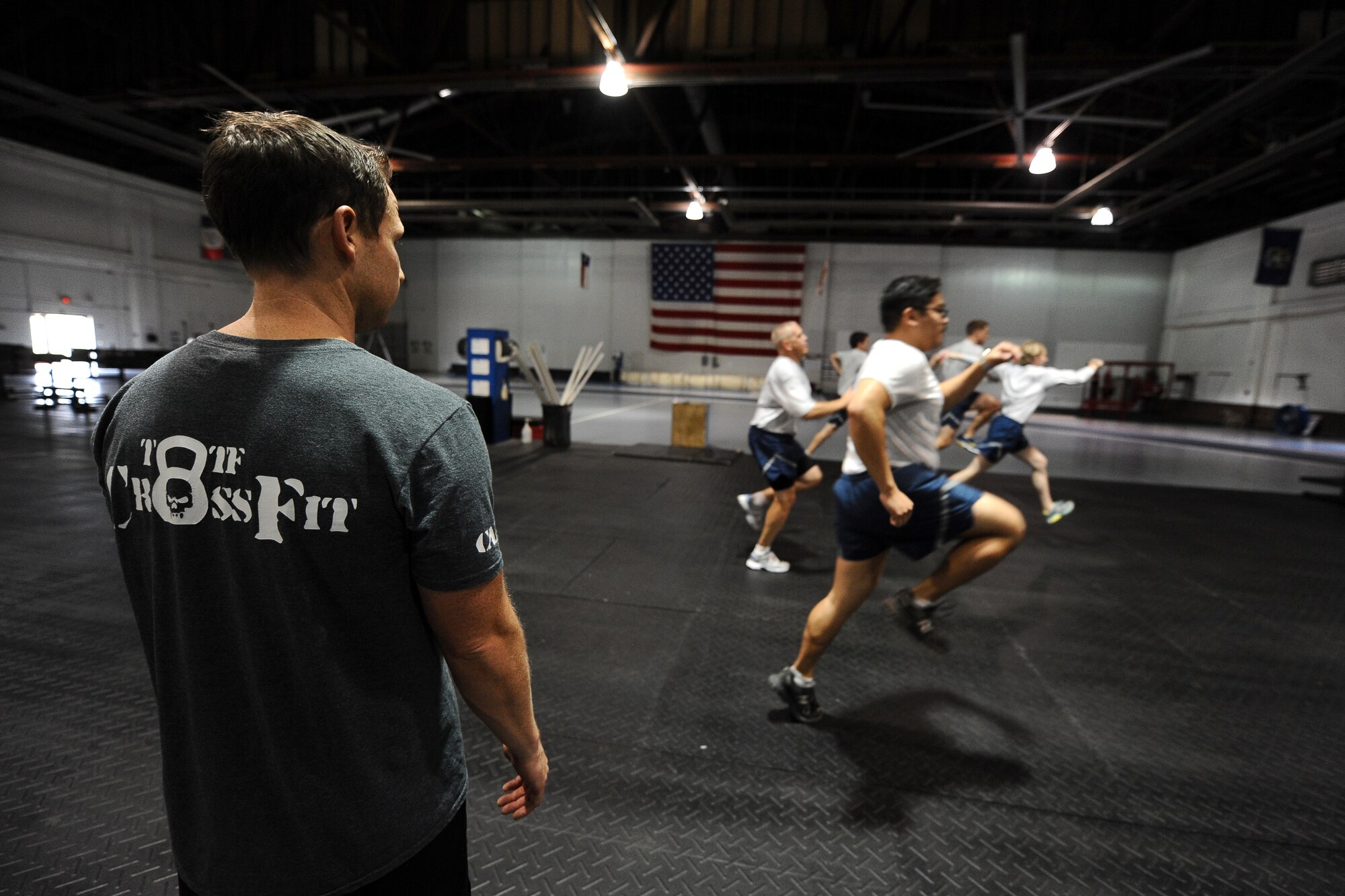 Members of Team Offutt participate in a tactical fitness introduction course during Comprehensive Airman Fitness Day Sept. 26 at the Offutt Field House.  The CAF day consisted of numerous physical activities throughout the day.  (U.S. Air Force photo by Josh Plueger/Released)