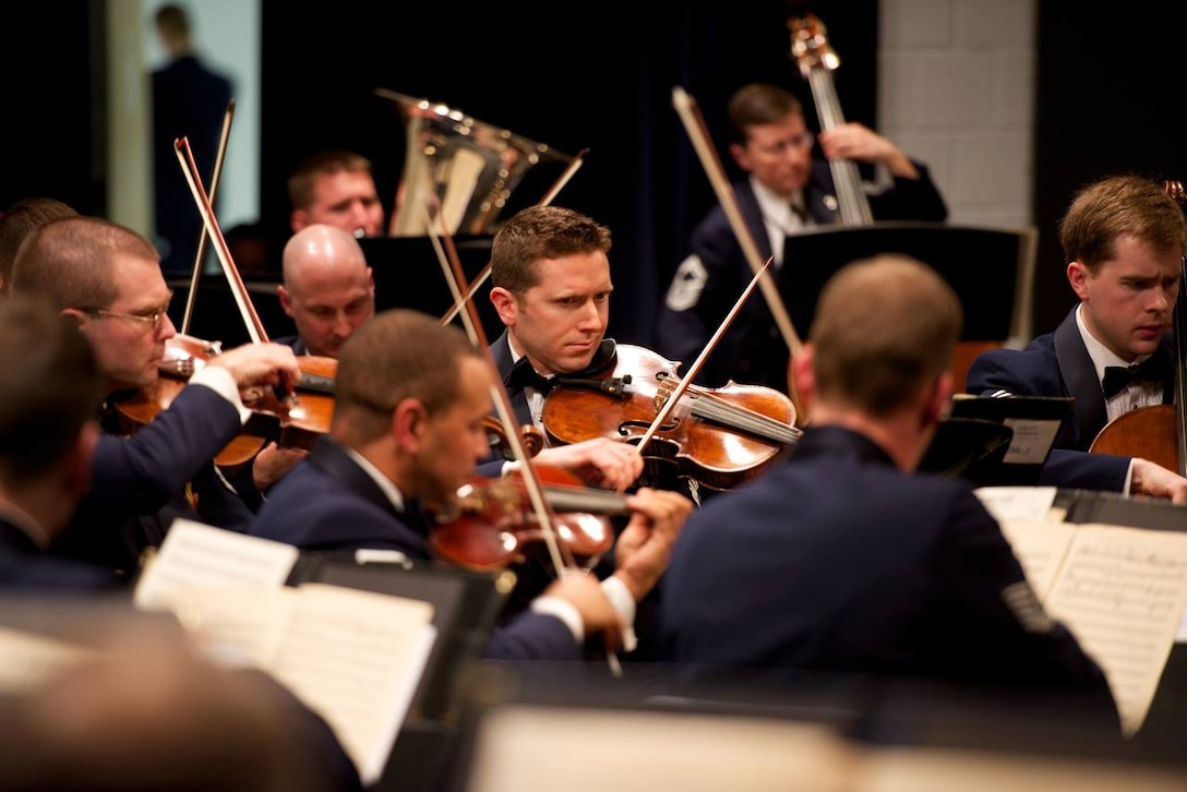 The Air Force Orchestra performed three local concerts of American music, including the Washington DC area premiere of Arlington Sons, a piece written by Scott Eyerly for Metropolitan Opera singer David Pittsinger and his son Richard. (U.S. Air Force Photo/released)