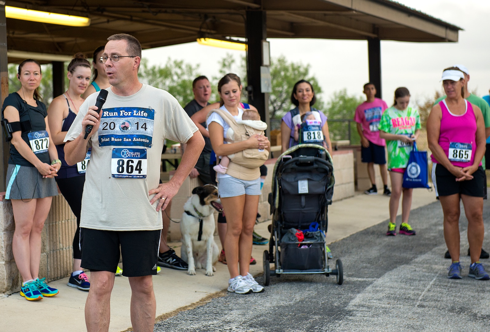 Col. John Andrus, 59th Medical Operations Group commander, delivers opening remarks at the 5k Run for life. (U.S. Air Force photo by Benjamin Faske/Released)
