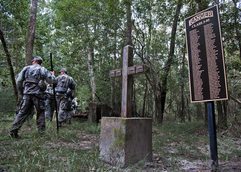 Soldiers from the 6th Ranger Training Battalion leave the memorial for the four fallen Rangers who lost their lives Feb. 16, 1995 and move to higher ground in the forest of Eglin Air Force Base’s range Sept. 25. More than 40 Soldiers participated in the excursion to the memorial that followed in the footsteps of the tragic squad to learn from their experience and understand what took place that night almost 20 years ago.  (U.S. Air Force photo/Samuel King Jr.)