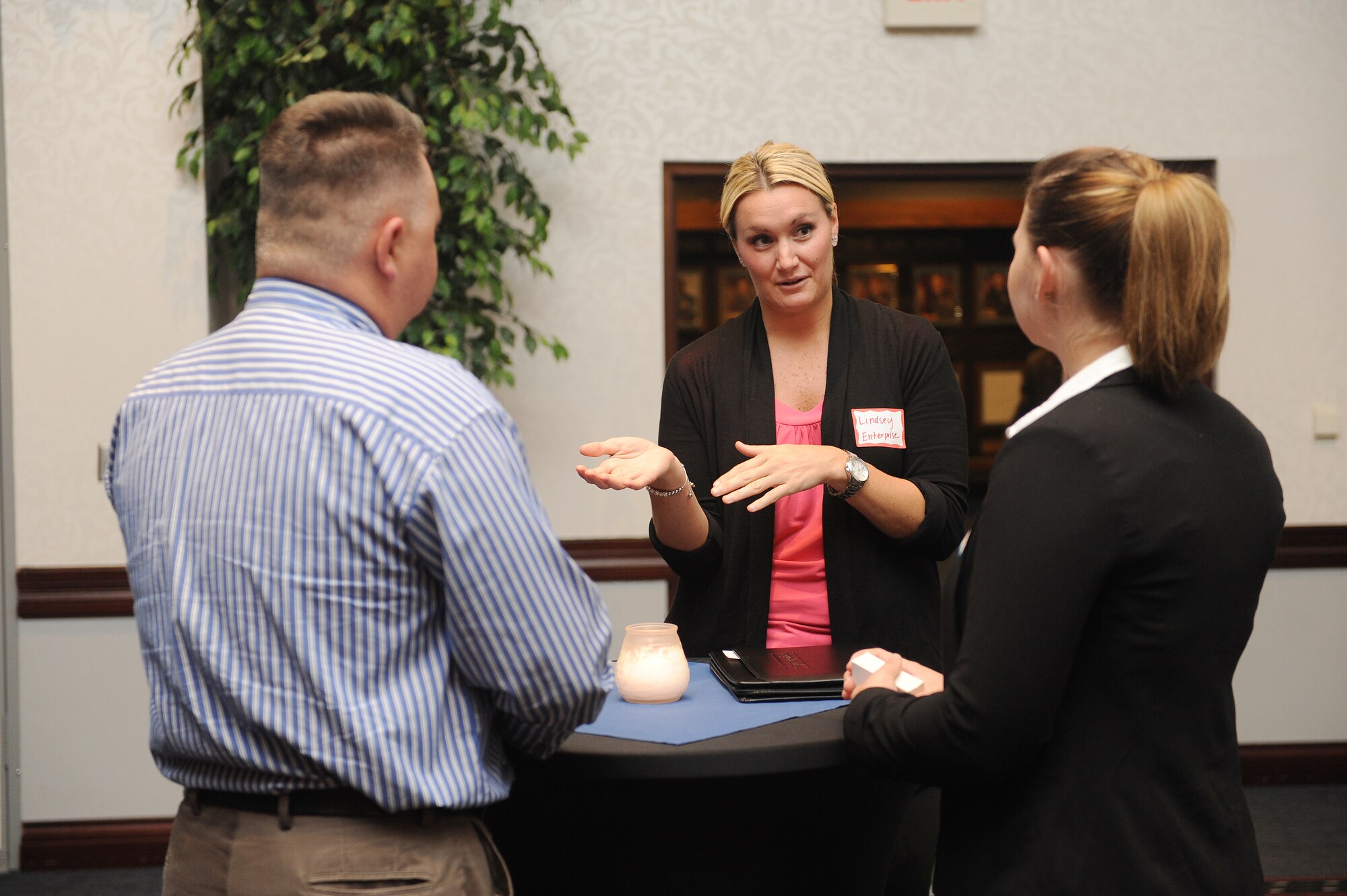 Lindsey King, a local car rental company employer, meets with prospective employees during a networking event at Scott Air Force Base, Ill., Sept. 25, 2014.  The event allowed military personnel to meet with prospective employers and find out more about the company to see if it would be a place they would like to work for.  (U.S. Air Force photo by Staff Sgt. Maria Bowman)