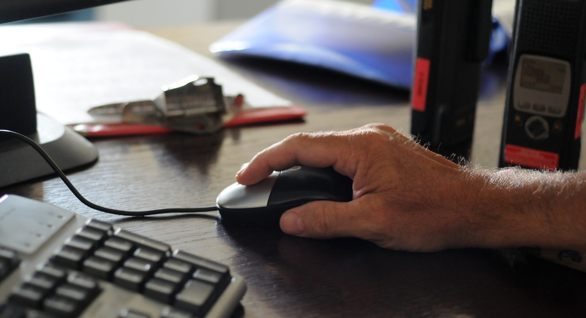 Paul Waites, 100th Logistics Readiness Squadron vehicle dispatcher from Littleport, Cambridgeshire, books a transportation request Sept. 8, 2014, on RAF Mildenhall, England. The vehicle operations element offers a 24/7 customer service support. (U.S. Air Force photo/Gina Randall/Released)