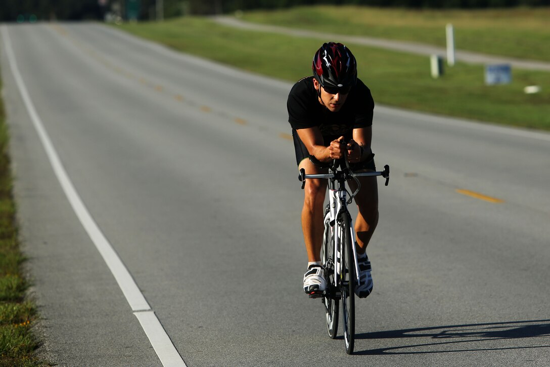Andrew Dominguez leads the Marine Corps Community Services’ Sprint Duathlon/Relay at Marine Corps Air Station Cherry Point, N.C., Sept. 27, 2014. Dominguez, a native of San Antonio, finished first with a time of one hour and eight minutes. Dominguez also finished first in MCCS’s Sprint Triathlon/Relay in August. 