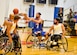 Retired Senior Airman Ryan Gallo makes a pass during the Air Force wheelchair basketball game against the Navy at the 2014 Warrior Games Sept. 29, 2014, at the United States Olympic Training Center in Colorado Springs, Colo. The Air Force team lost 38-19 and will play Special Operations in the next round. (U.S Air Force photo/Staff Sgt. Devon Suits)  