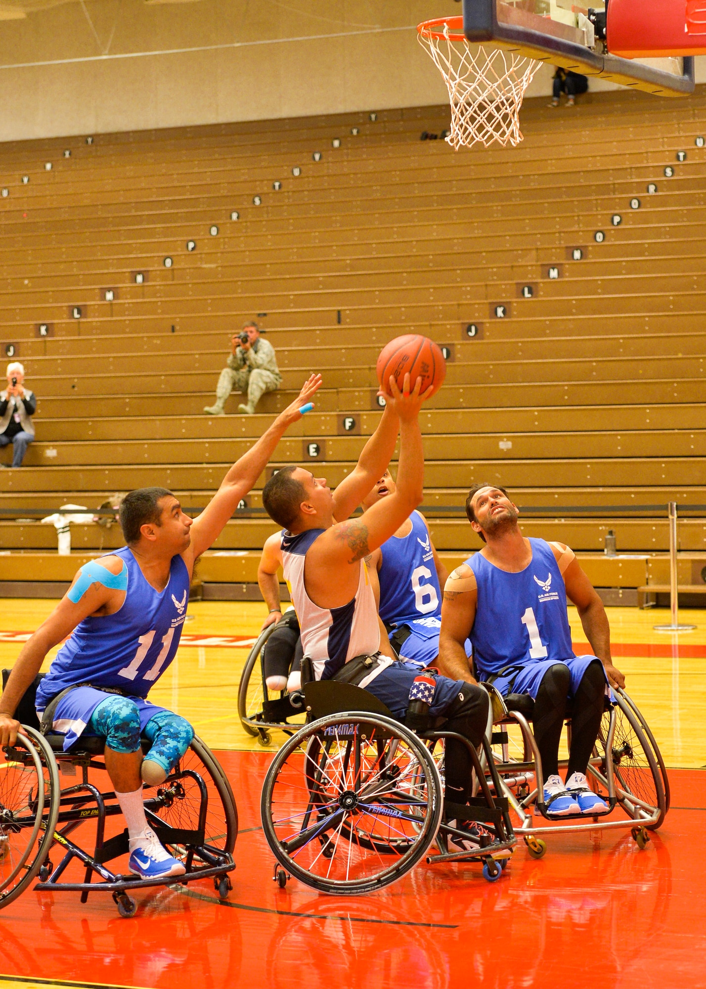 The Air Force and the Navy faced off in the first wheelchair basketball game of the 2014 Warrior Games Sept. 29, 2014, at the United States Olympic Training Center in Colorado Springs, Colo. The Navy won 38-19 and will face the Army in the next round. (U.S Air Force photo/Staff Sgt. Devon Suits)