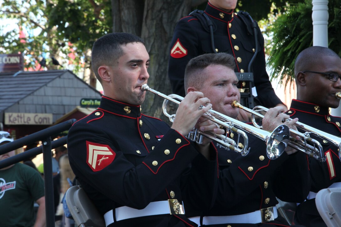 WEST SPRINGFIELD, Mass.—Cpl. Steven Farley, horn player for the Marine Corps Band Parris Island, performs during the Marine Band performance at the Big Eastern States Exposition, Sept. 27. Marine Musicians perform an average of 250 times each year. Performances range from military ceremonies to public concerts like the Big E. 