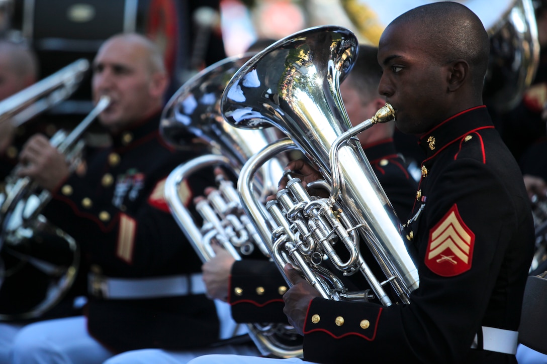 WEST SPRINGFIELD, Mass.— Chief Warrant Officer 2 Stephen Giove, the Officer in Charge and director of the Parris Island Marine Corps Band, sings a tune during the Marine Band performance at the Big Eastern States Exposition, Sept. 27. Marine Musicians perform an average of 250 times each year. Performances range from military ceremonies to public concerts like the Big E. 