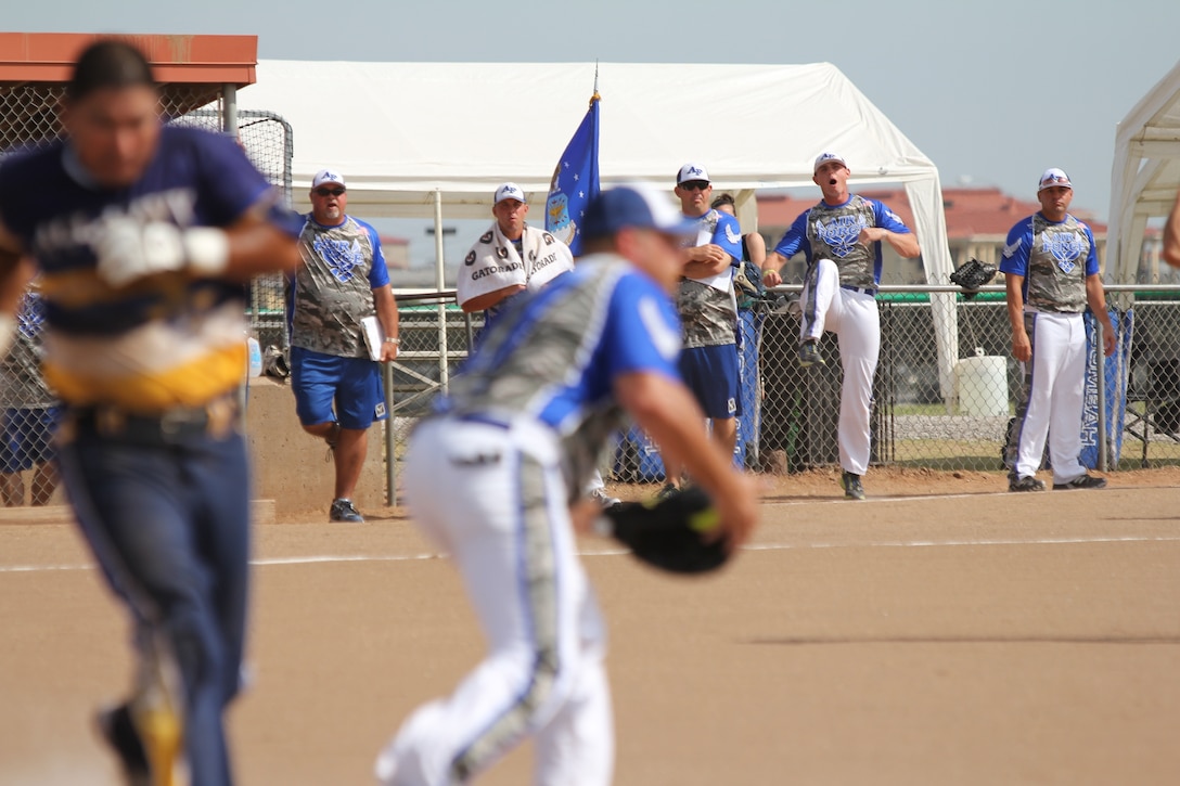 Air Force celebrates a close play at first at the 2014 Armed Forces Softball Championship at Fort Sill, Okla. 14-19 September.