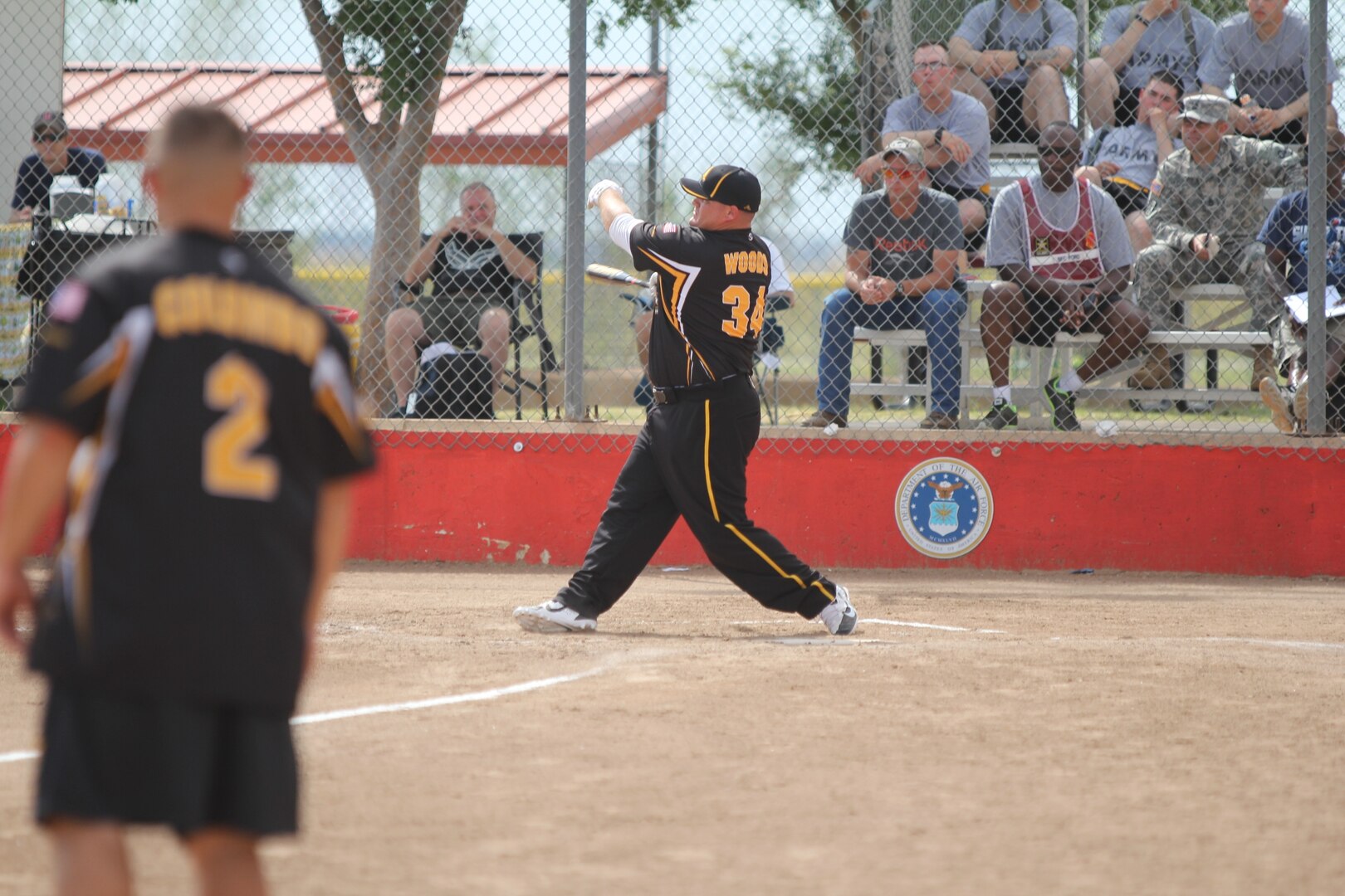 Army Spec. Marshal Woods (Schofields Barracks, HI) nails a line-drive at the 2014 Armed Forces Softball Championship at Fort Sill, Okla. 14-19 September.