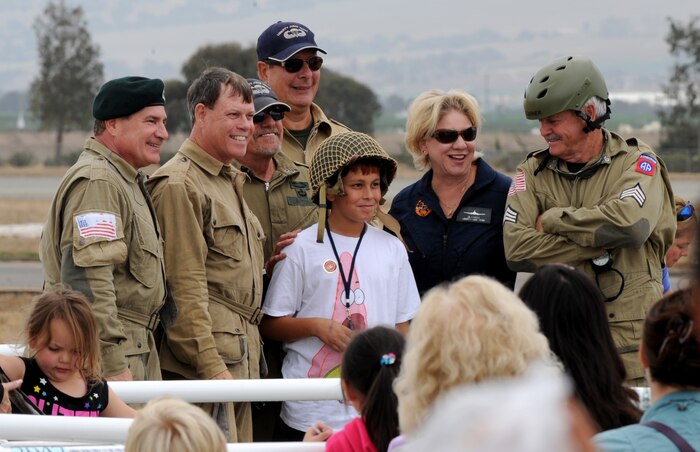 Members of the Liberty Jump Team pose for a picture during the California International Air Show in Salinas, Calif., Sept. 28, 2014. The team utilizes static-line parachutes and a C-47 Skytrain to pay tribute to the D-Day invasion of Western Europe during World War II. (U.S. Air Force photo by Staff Sgt. Robert M. Trujillo/Released)
